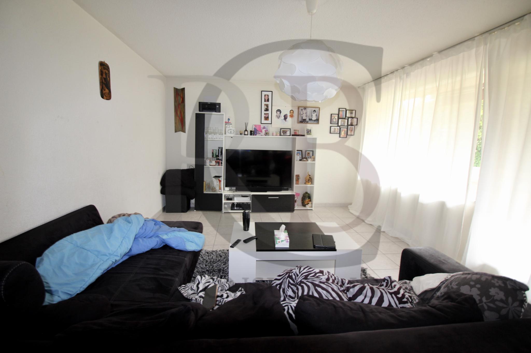 Appartement Locatif dans PPE avec Parking sous-terrain