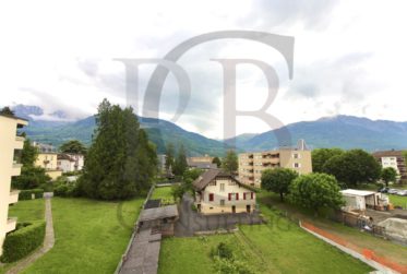 Appartement de rendement dans PPE de 2 immeubles avec parking sous-terrain