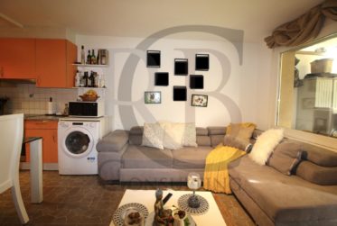 Appartement de rendement dans PPE de 2 immeubles avec parking sous-terrain