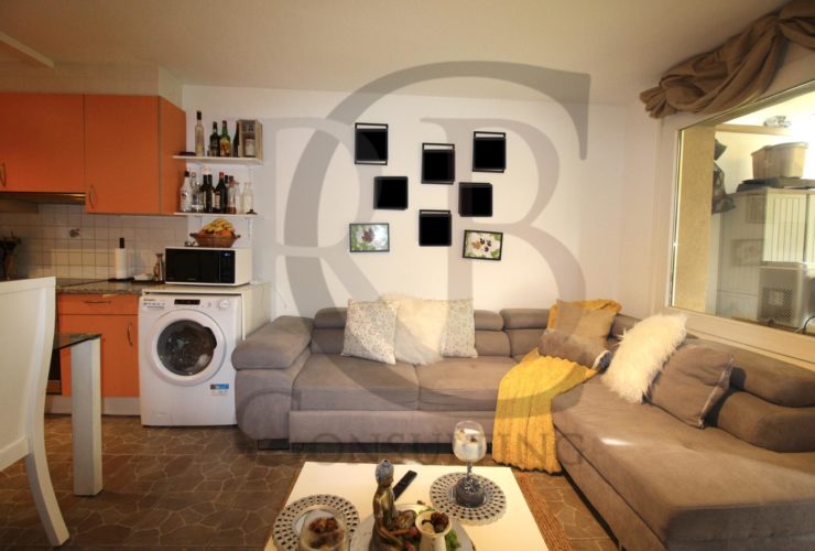 Appartement de rendement dans PPE de 2 immeubles avec parking sous-terrain