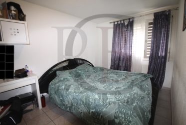Appartement Locatif dans PPE avec Parking sous-terrain